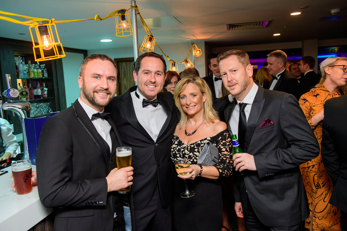 Group of people holding drinks at the bar during The Greater Lincolnshire Construction and Property Awards 2020