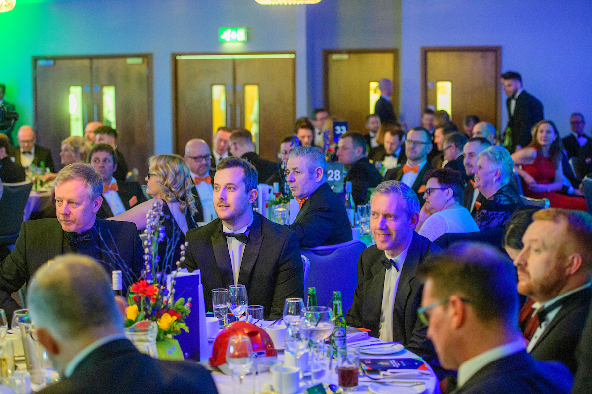 Group of people in eveningwear seated and watching the stage off screen at The Greater Lincolnshire Construction and Property Awards 2020