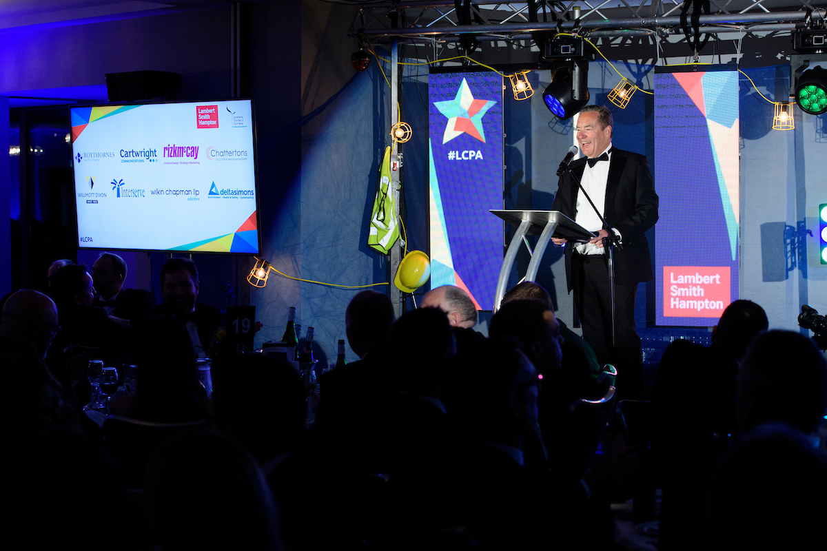 Greater Lincolnshire Construction & Property Awards 2020 host Jeff Stelling on stage with microphone