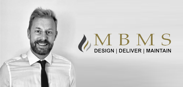 Black and white picture of man in white shirt and dark tie, Martin Badley director of MBMS with logo and strapline