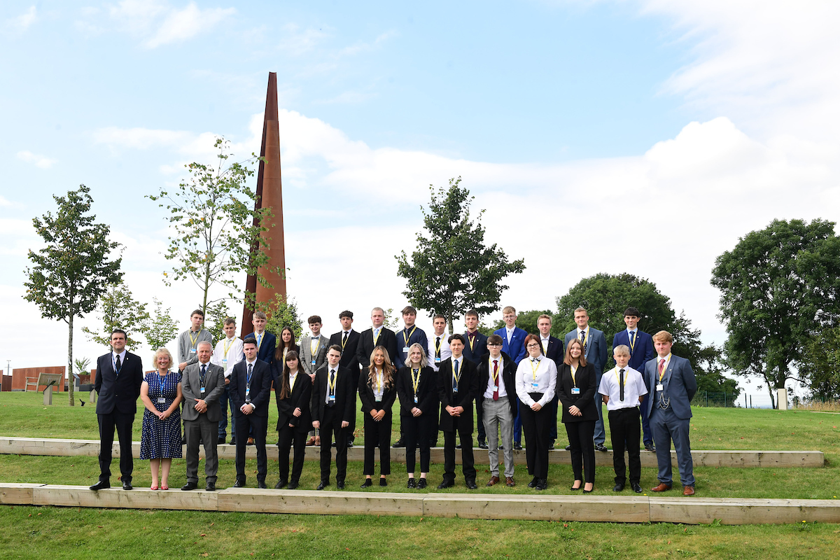 Group of men, women and students of IASTI Newark at the International Bomber Command Centre