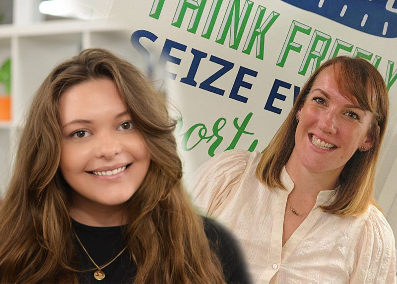 Paige Gregory and Sarah Lawrence at Systematic, a woman on the left with brown long hair, woman on the left blonde wearing white, in front of banner