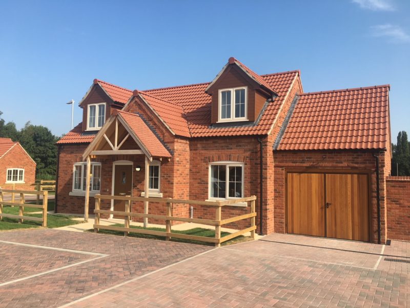 Newbuild houses in red brick finish