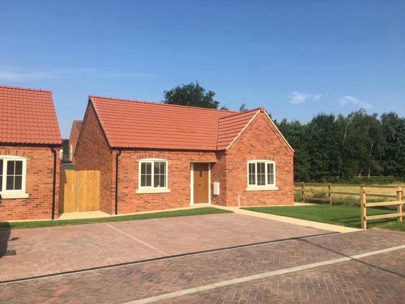 Newbuild houses in red brick finish