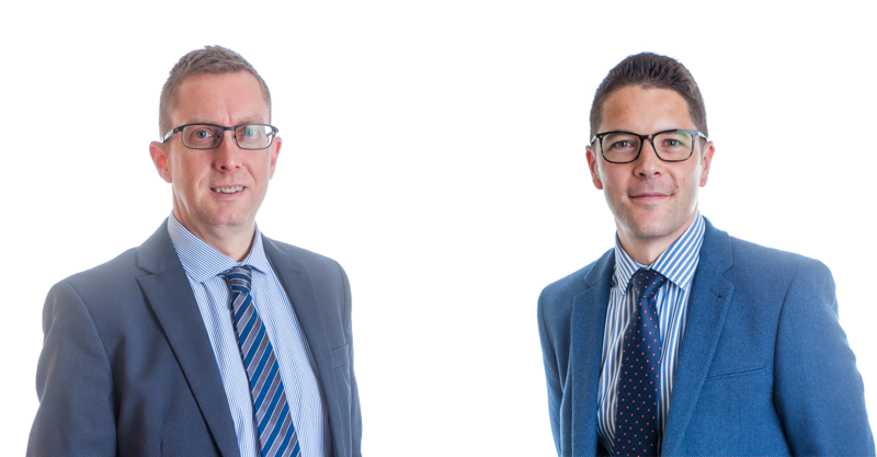 Two men in suits with ties on white background. Left is Mike Beckett, right is Kevin Hopper, both from Forrester Boyd,