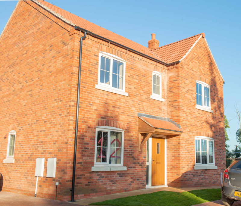 Newbuild houses in red brick finish