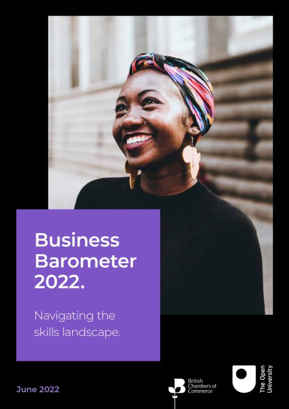 Woman wearing headscarf smiling, with purple inset and white text